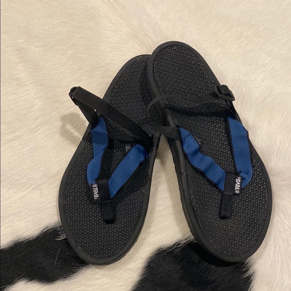 black Teva Original Universal sandals with blue accents